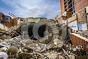 The destruction of old house with rubble