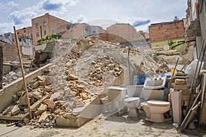 The destruction of old house with rubble