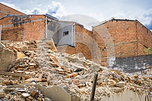 The destruction of old house with rubble