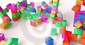 Destruction of a toy building made of colored cubes.