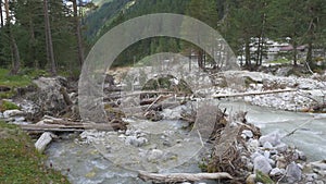 Destructive power of nature. Panorama of a mountain river. Consequences of mudflow