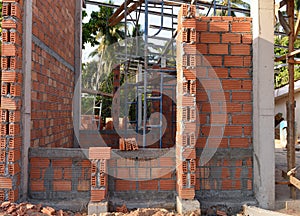 Detached house of brick in massive construction