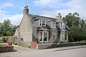 Detached house in the village Braemar in Scotland. photo