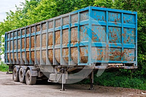 detached rusted trailer for scrap metal, reinforced