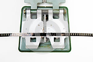 Detail of 8mm vintage splicer with film