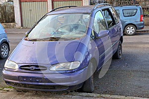 The detail of an abandoned broken car