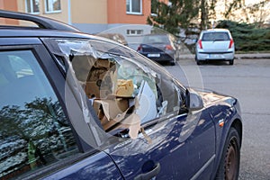 The detail of an abandoned broken car