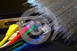 Detail of ADSL modem router with luminescent fiber optic lights and lan cable rj45