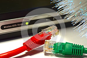 Detail of ADSL modem router with luminescent fiber optic lights and lan cable rj45