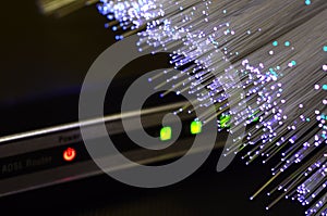 Detail of ADSL modem router with luminescent fiber optic lights and lan cable rj45