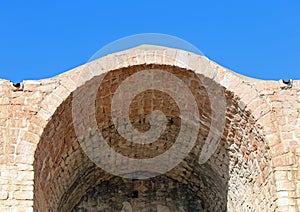 Detail of an ancient Arcade in bricks