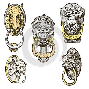 Detail ancient building. architectural ornamental elements, wooden door knob, knocker or handles. lion and horse