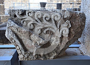 Detail of an Ancient Capital in Capernaum photo