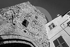 Ancient medieval tower in black and white photo