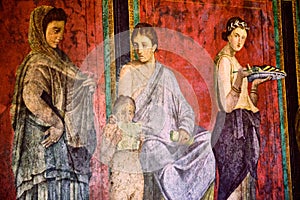 Detail of the ancient painting in the Villa of the Mysteries in Pompeii.