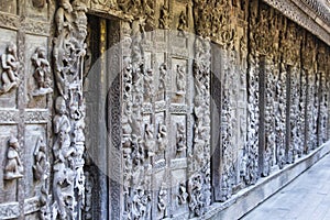 Detail of ancient wooden carved wall ornament with mythical figures, Shwenandaw monastery, Mandalay, Myanmar or Burma