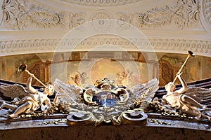 Detail with angels playing the trumpet, inside the beautiful church of San Carlo Borromeo in Vienna.