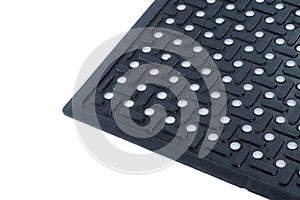 Detail of anti-fatigue mat on white background