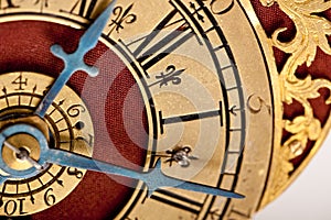 Detail of antique gold and red clock