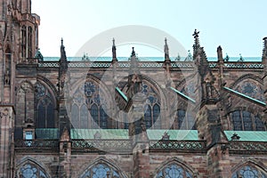 detail of the architectural flying buttresses on the roof of Strasbourg Cathedral in France