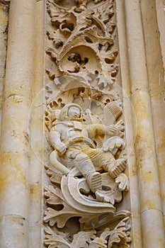 Detail of an astronaut carved in stone on the facade of the Cathedral