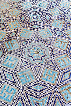 Detail of the azure blue mosaic tiles on the wall of the Registan madrassa, Samarkand, Uzbekistan