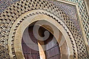 Detail of Bab Mansour Gate at El Hedime square, decorated with mosaic ceramic tiles, in Meknes, Morocco