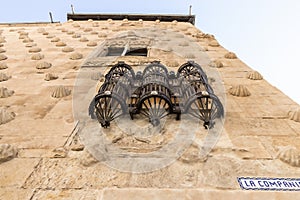 Detail of Balcony in Facade of Casa de las Conchas in Salamanca, Spain, covered in scalloped shells, Community of Castile and LeÃ³