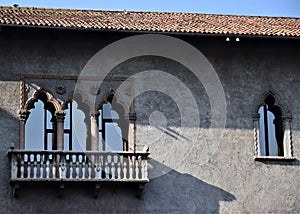 Detail, with balcony and mullioned window, of the wall of the internal courtyard of Castelvecchio in Verona.