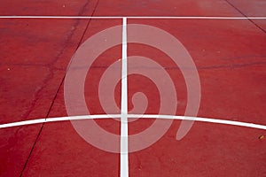 Detail of a basketball court surface.