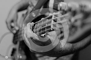 Detail of a bass player photo