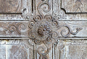 Detail of a beautiful old wooden door of Church Maria Strassengel, a 14th century Gothic pilgrimage church in the town of