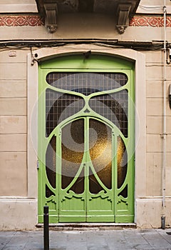 Detail of Art-Nouveau door in barcelona front view