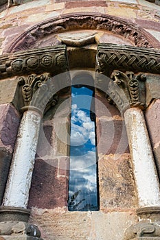 Detail of beautiful window in romanesque abse in San Esteban de photo