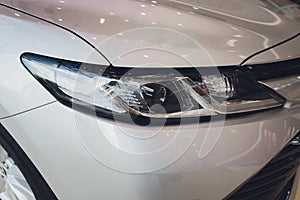 Detail of a beauty and fast car with headlight.