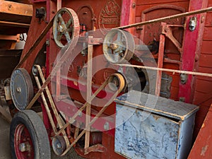 Detail of belt transmission on an old thresher machine