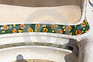 Detail of the bench in the park Guell, designed by Antonio Gaudi. Concept of travel, tourism and vacation photo