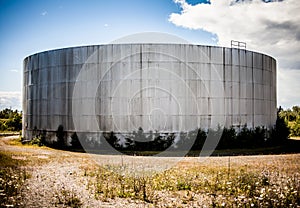 Detail of a big abandoned oil refinery gas tank