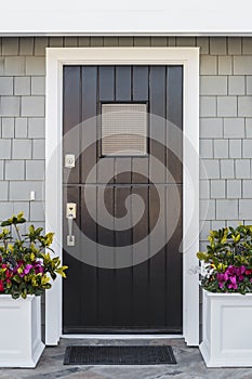 Detail of black front door to home photo