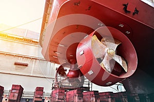 Detail of black stern with scaffolding and ship Twin propeller.