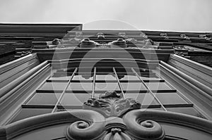Detail on black and white of the facade of a historical building in Delft. photo