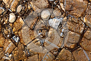 Detail of a block of rusty compacted cans