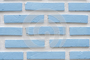 Detail of a blue brick wall texture white background