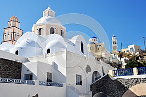 Detail blue roof of an Orthodox church and bell tower on the Greek island of Santorini