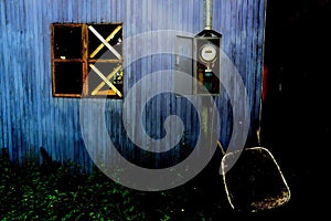 Detail of a blue wooden house in the little Caribbean town of Tortuguero, Costa Rica