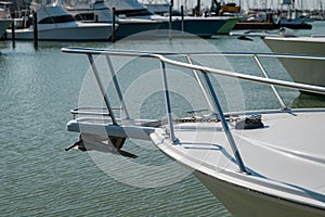 Detail of boat anchor and windlass on bow of a sport fishing yacht