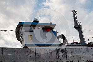 Detail of a boat with a pilothouse photo
