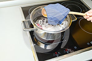 The detail of boiling of home made provisional textile masks