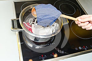 The detail of boiling of home made provisional textile masks