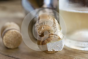 Detail of a bottle of bubbly white wine